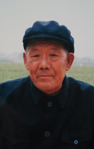 梁西民