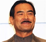辻万长